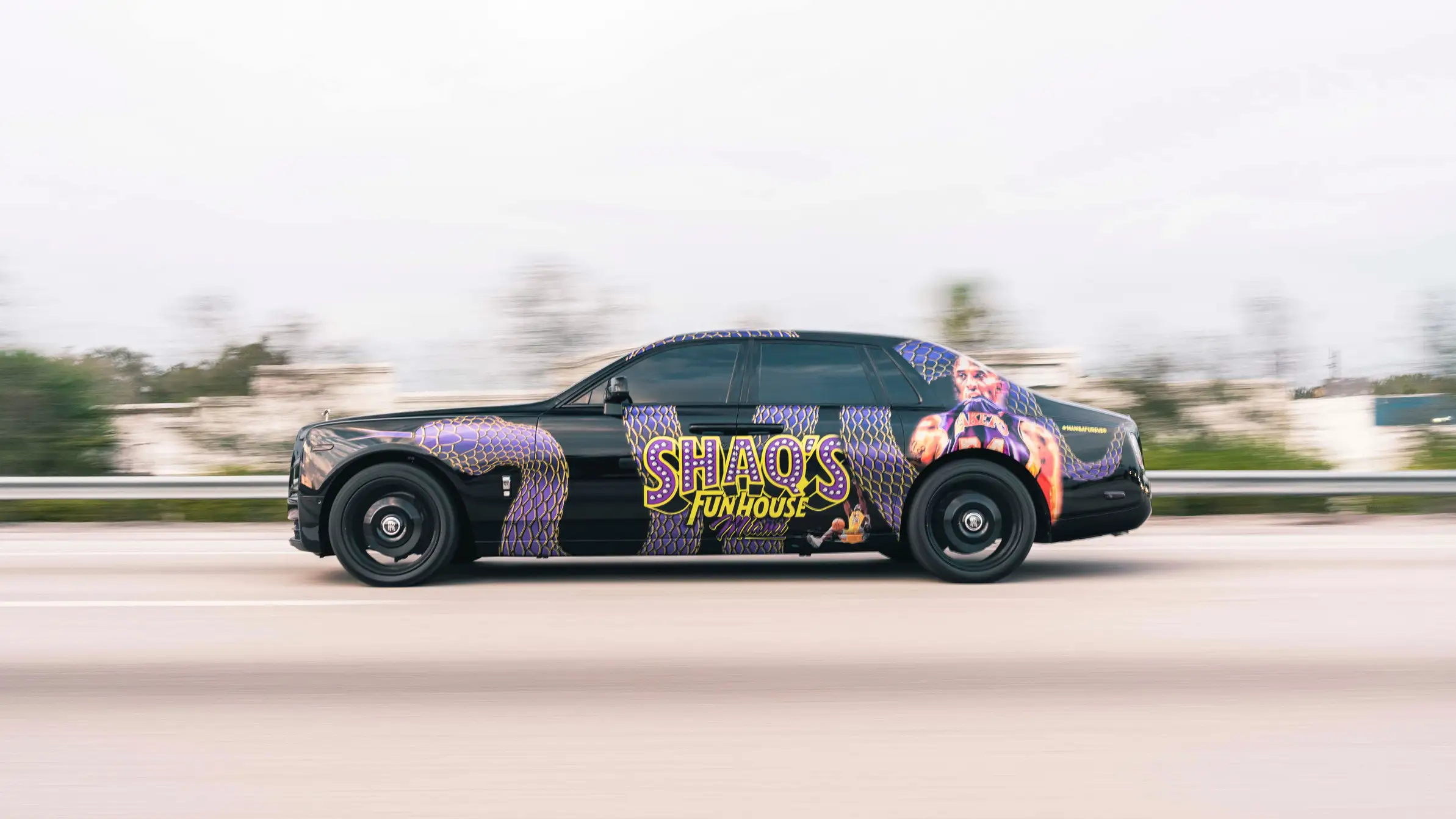 shaqs fun house custom wrapped rolls royce rental mph club