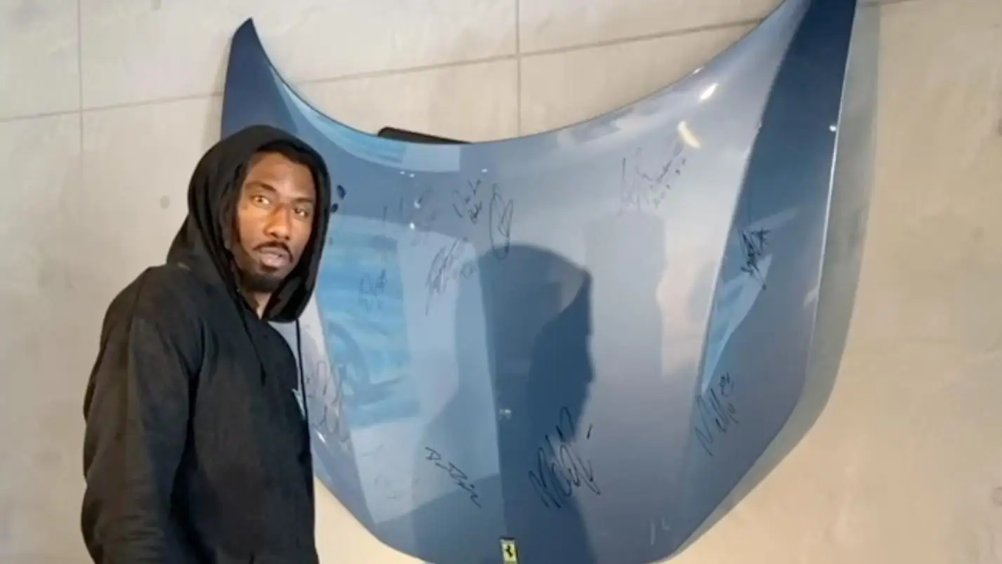 amare stoudemire signing mph club blue ferrari hood