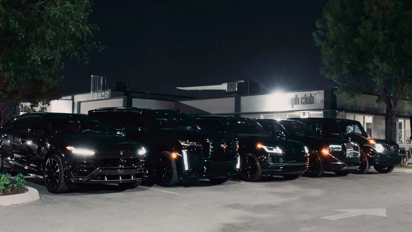luxury suv rental lineup night mph club2