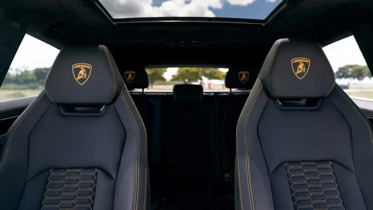yellow lamborghini urus rental interor