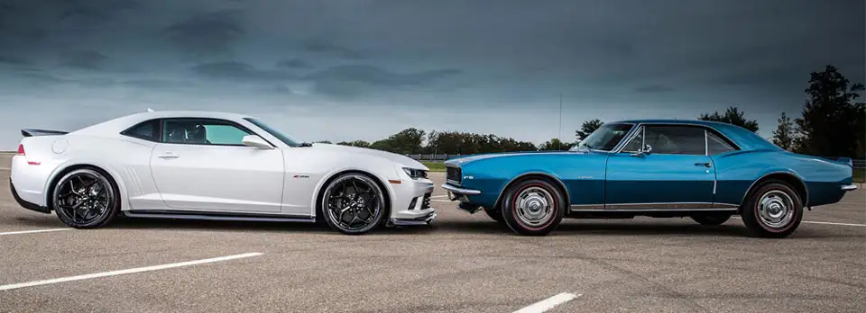 2014 Chevrolet Camaro Z28 and 1967 Chevrolet Camaro Z28 side
