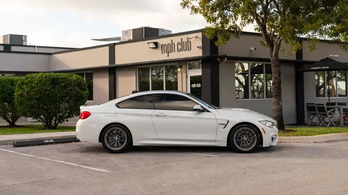 BMW M4 rental side view mph club