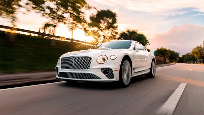 White on red Bentley GT rental Monaco rolling view mph club