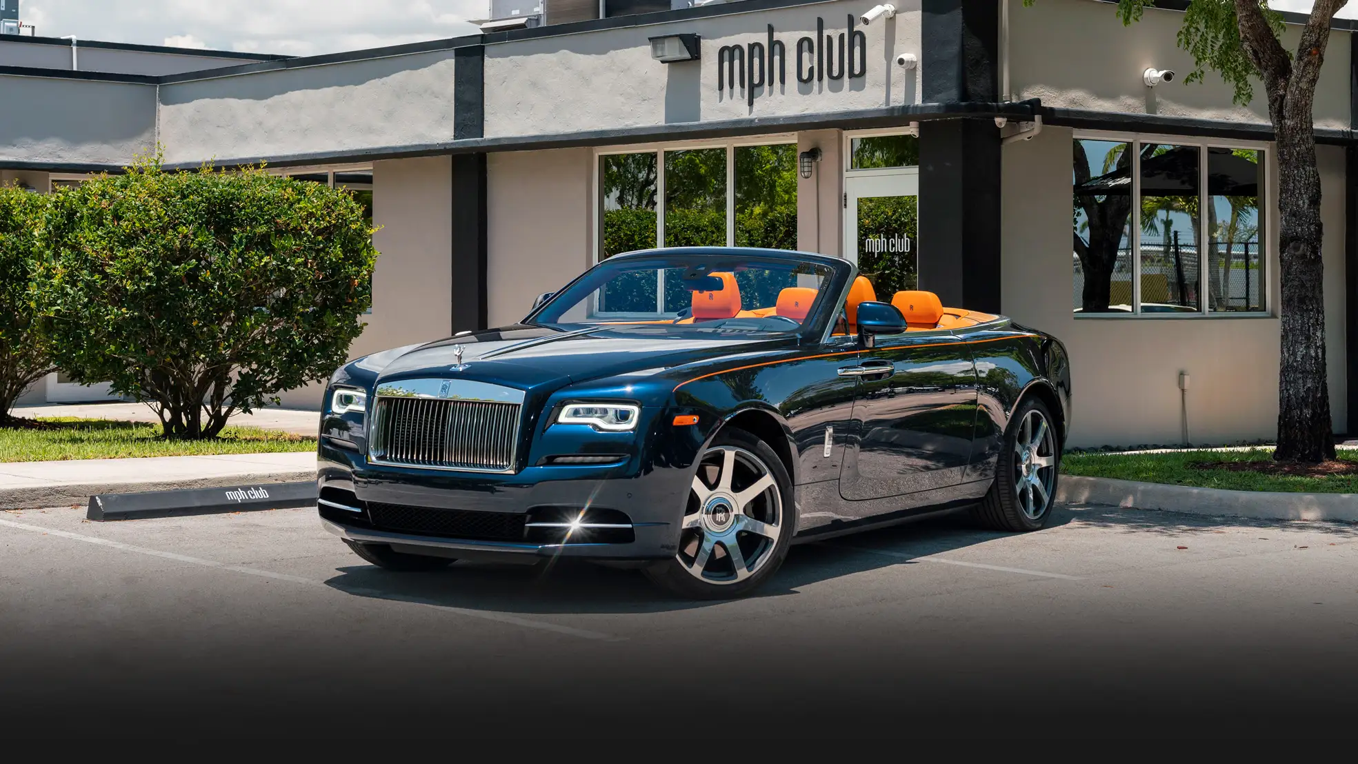 Blue Rolls Royce Dawn rental profile view mph club