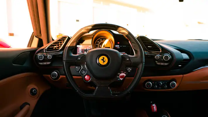 Red Ferrari 488 GTB rental dashboard view mph club