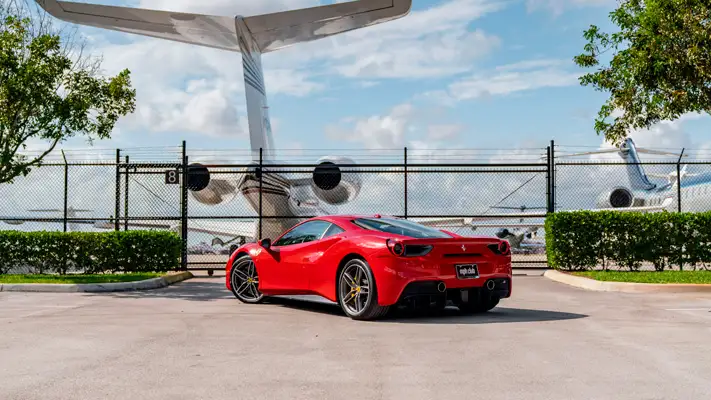 Red Ferrari 488 GTB rental rear view mph club