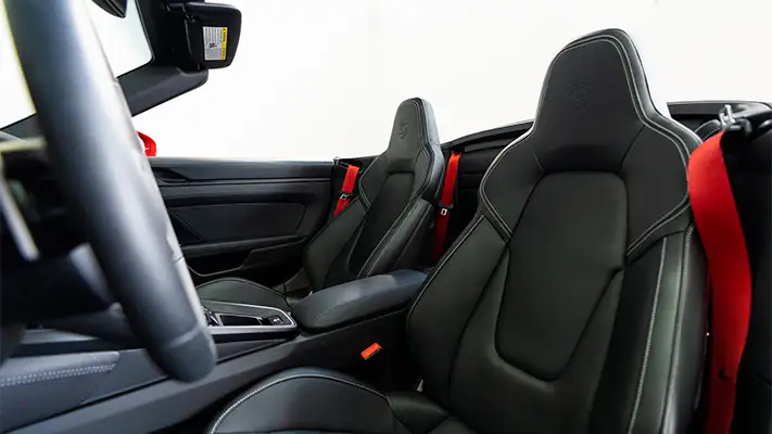 Red Porsche 911 Carrera Cabriolet rental interior view mph club
