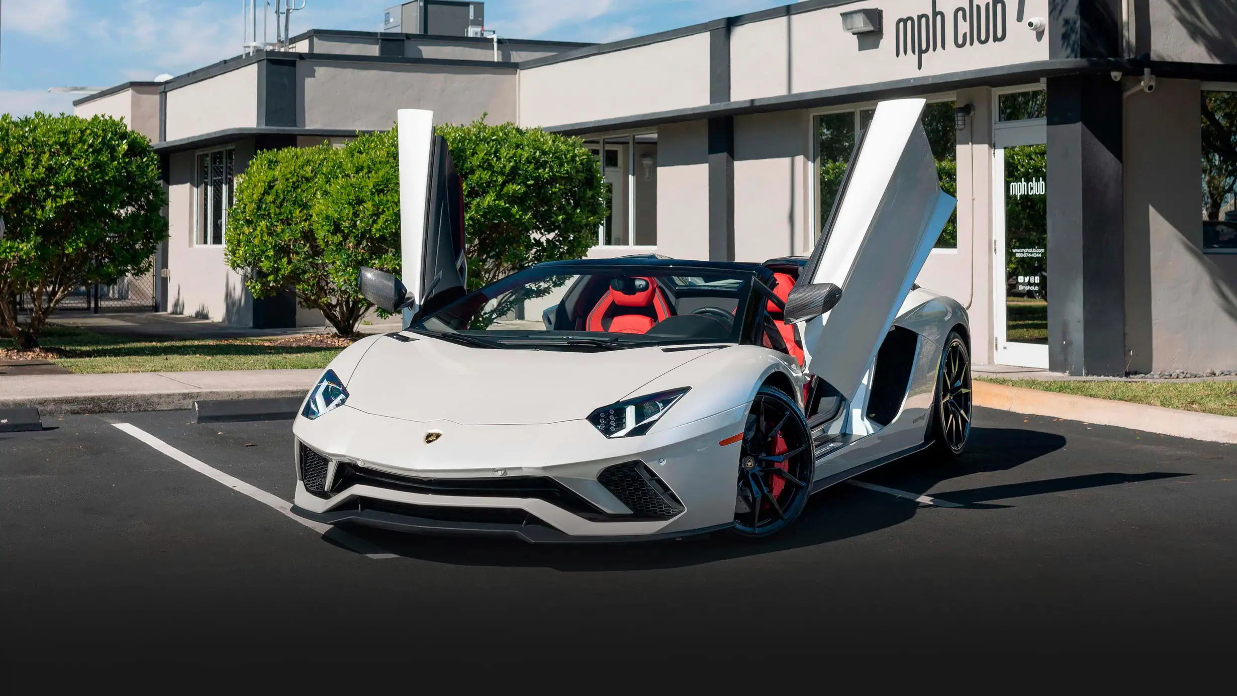 White Lamborghini Aventador S Roadster for rent Monaco profile view mph club