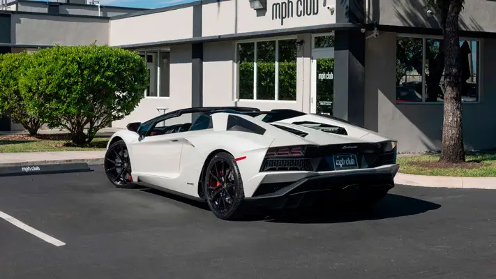 White Lamborghini Aventador S Roadster for rent Monaco rear view mph club