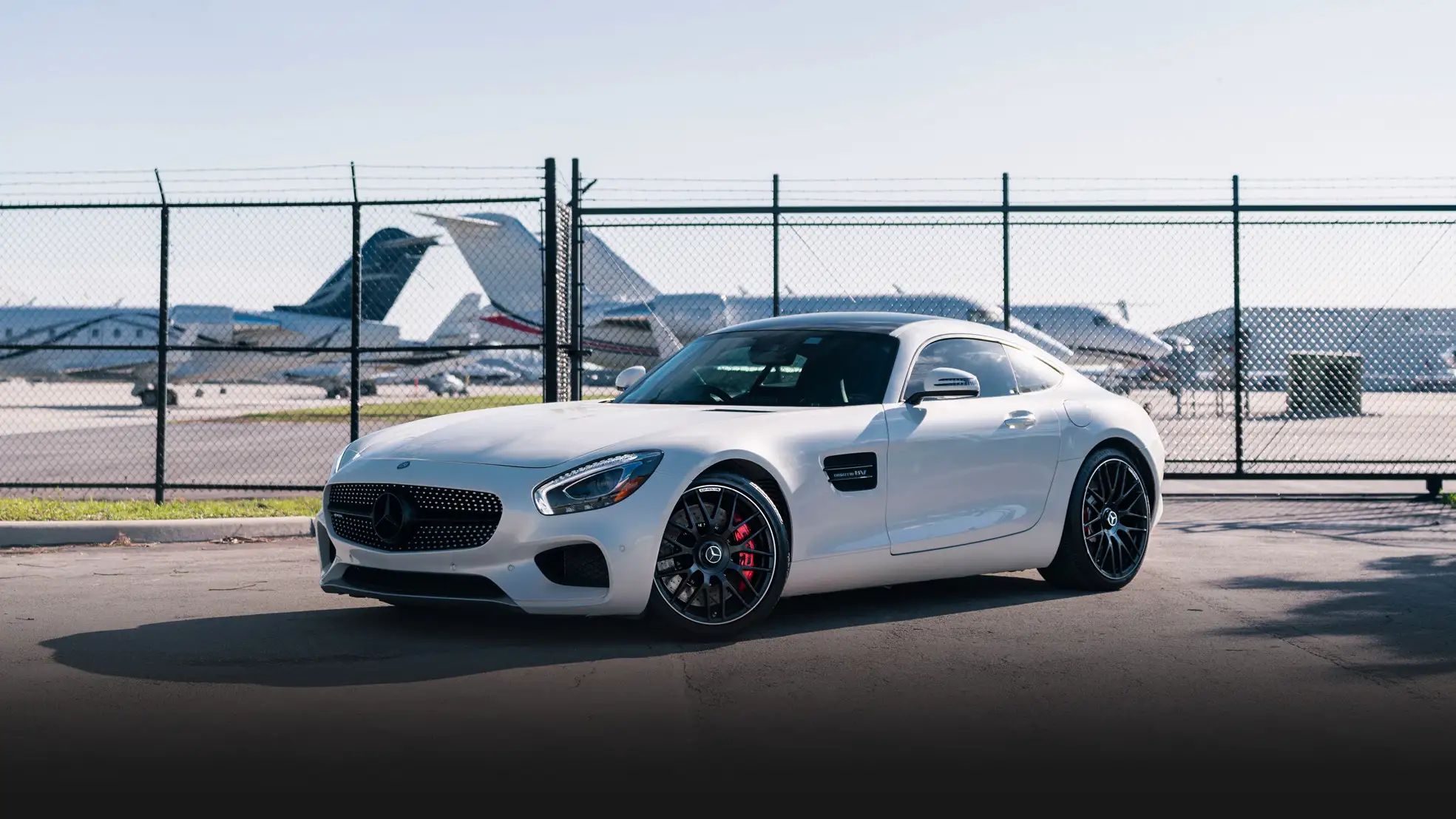 White Mercedes Benz AMG GTS rental profile view mph club