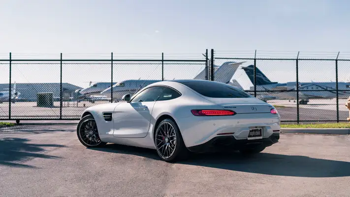 White Mercedes Benz AMG GTS rental side view mph club
