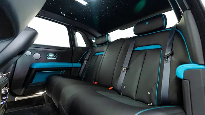 White on blue Rolls Royce Ghost interior view rental mph club