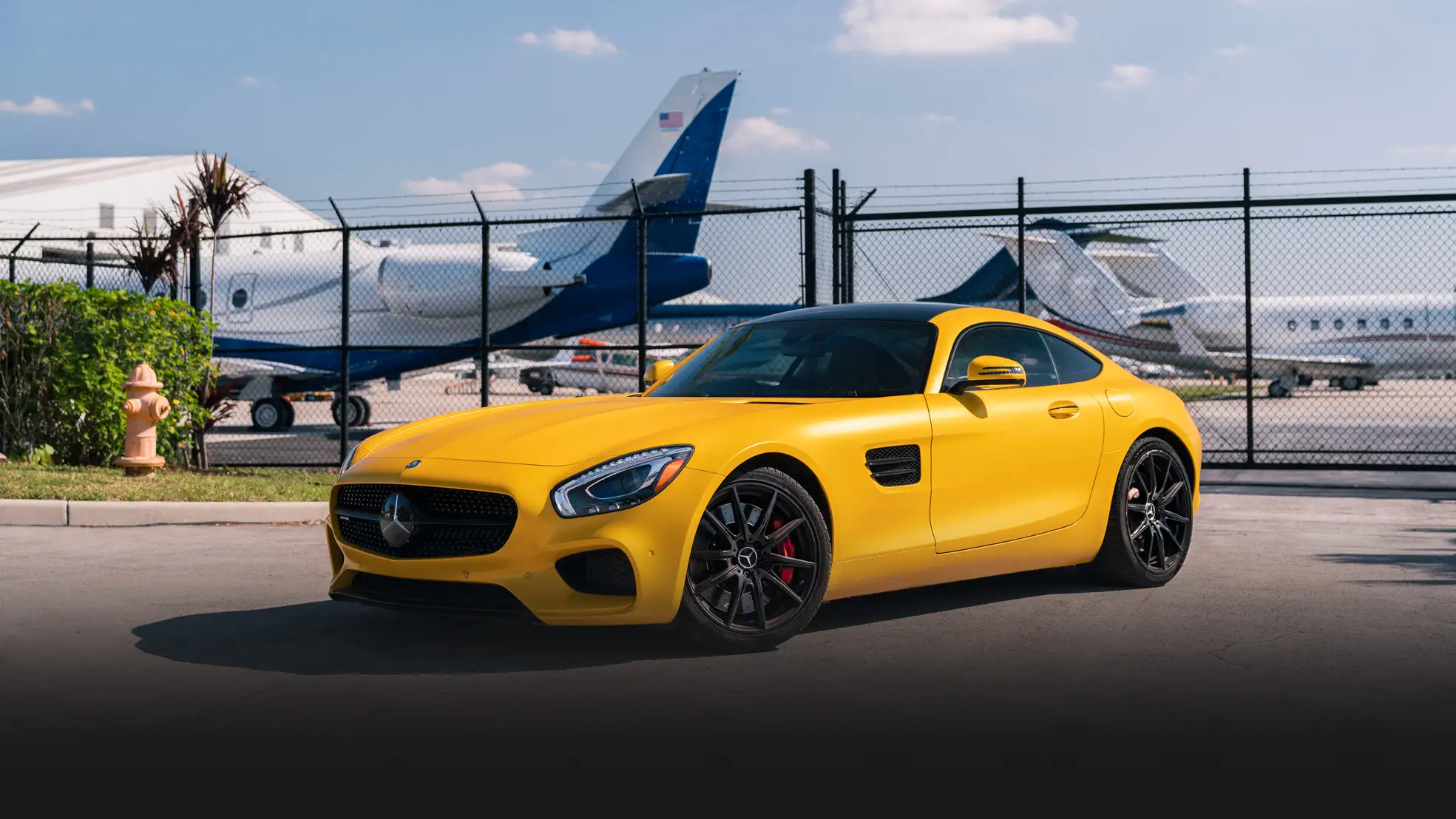 Yellow Mercedes Benz AMG GTS rental profile view mph club