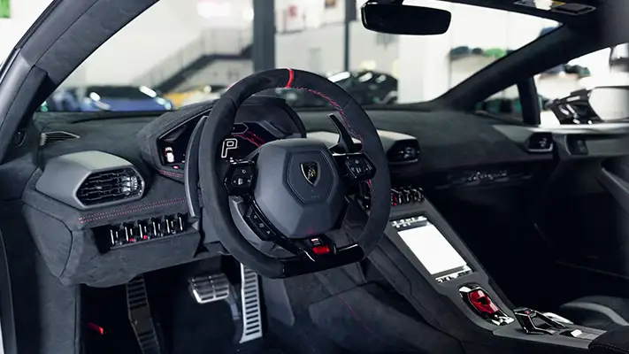 Lamborghini Huracan STO rental Monaco dashboard view mph club