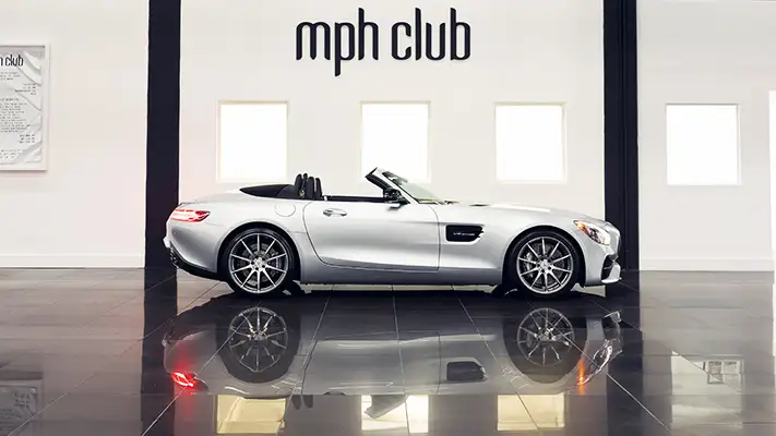 Gray Mercedes Benz GT Convertible rental side view mph club