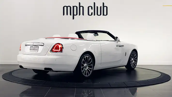 White on white Rolls Royce Dawn rental rear view mph club