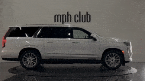 White on black Cadillac Escalade rental mph club