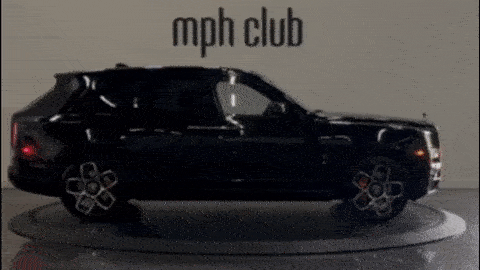 Black on orange Rolls Royce Cullinan black badge rental mph club