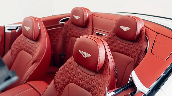 White with red Bentley Continental GTC rental interior view mph club