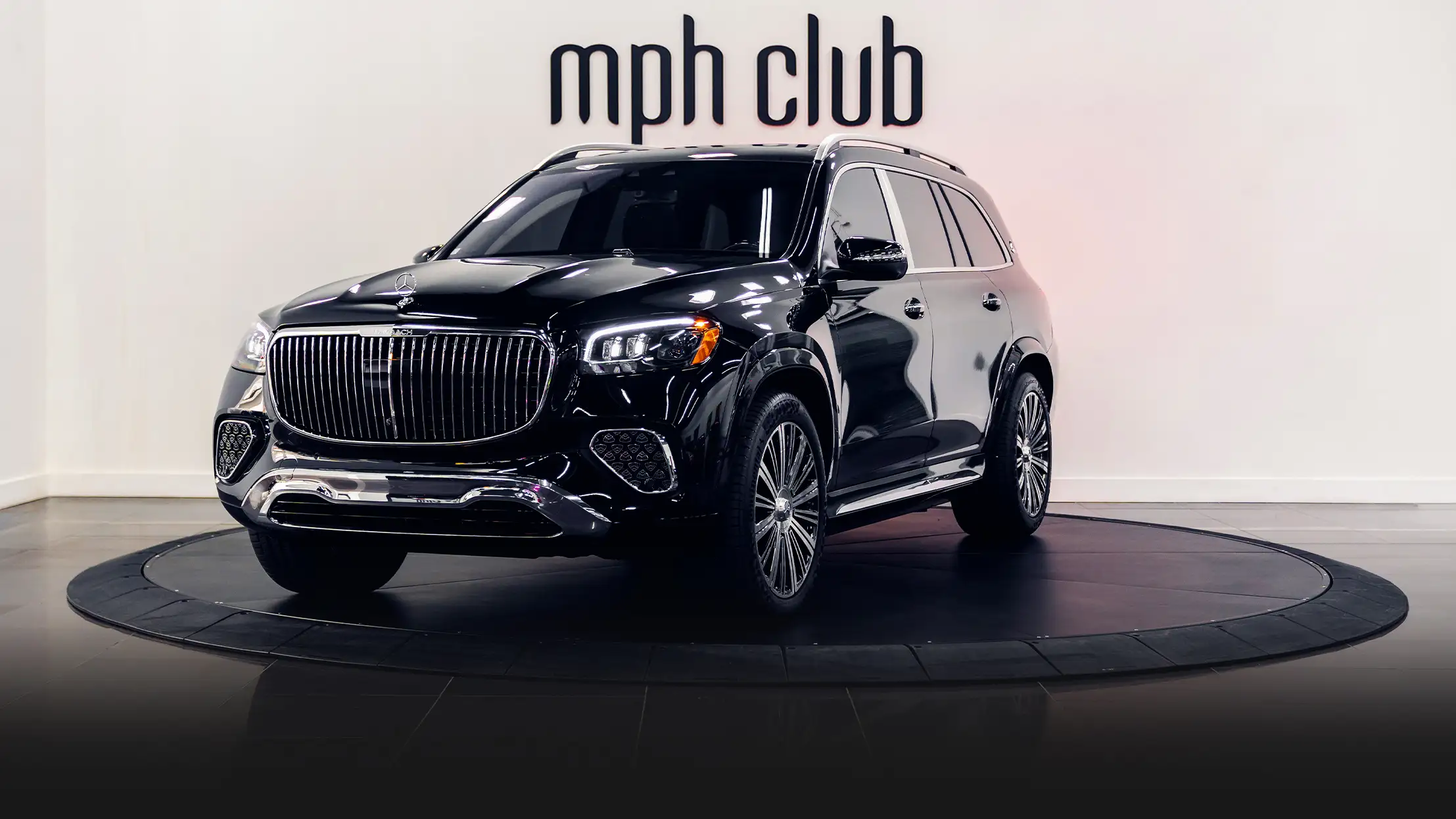 Black Mercedes Maybach SUV rental profile view - mph club