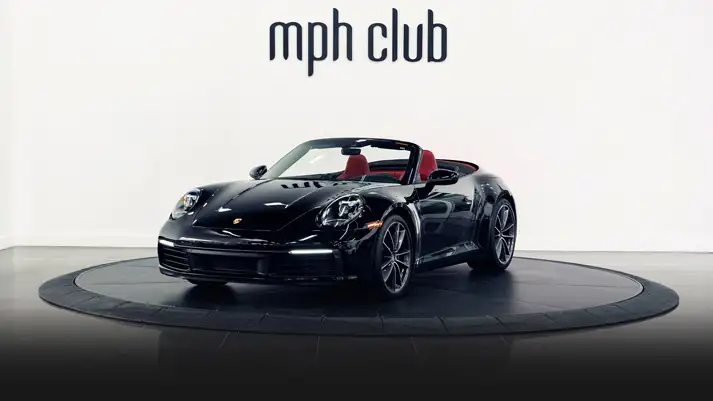 Black Porsche 911 Carrera Cabriolet rental profile view rszd - mph club