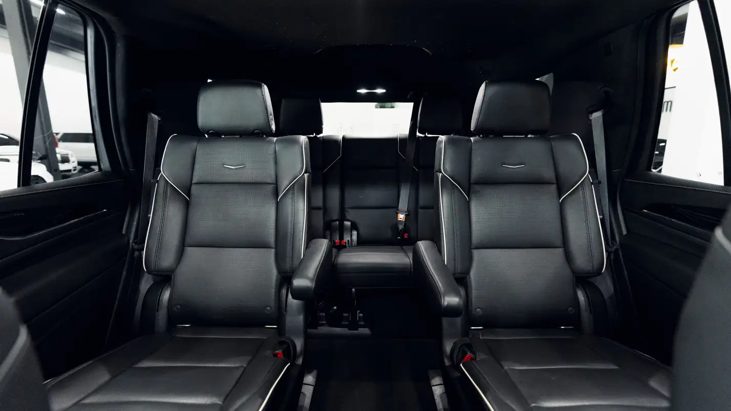 Backseat example of the spaciousness of the SUV while excluding the trunk and front interior.