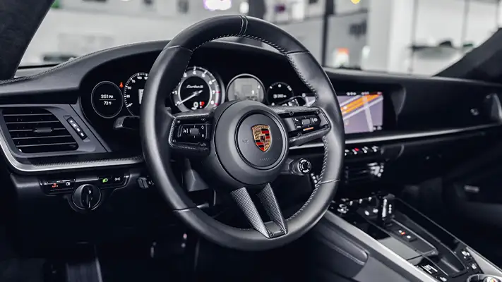Green Porsche 911 Turbo S dashboard view - mph club
