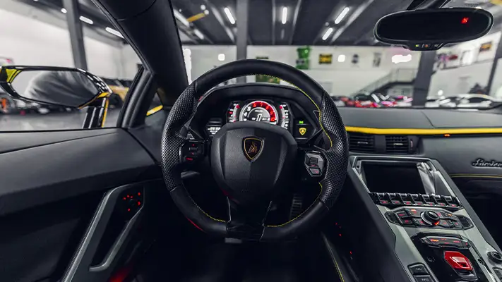 Yellow Lamborghini Aventador S rental dashboard view - mph club
