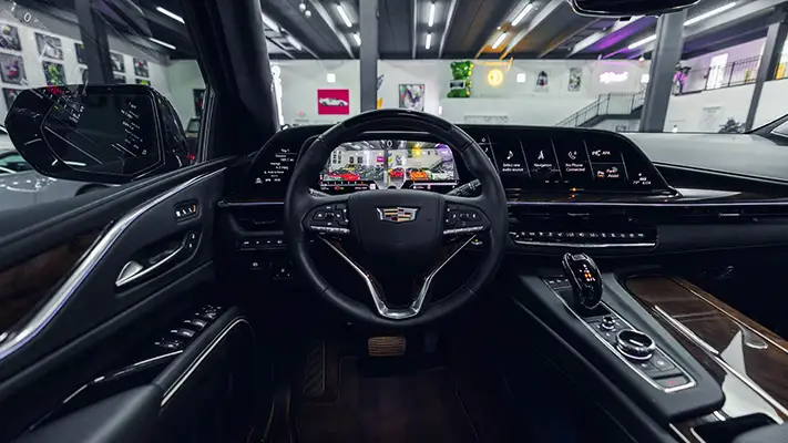 Black on black Cadillac Escalade rental dashboard view turntable - mph club