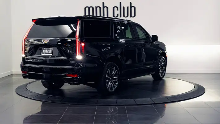 Black on black Cadillac Escalade rental rear view turntable - mph club