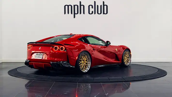 Red Ferrari 812 Superfast rental rear view - mph club