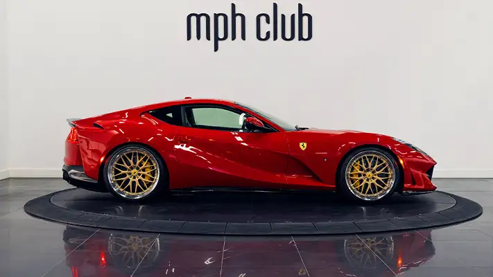 Red Ferrari 812 Superfast rental side view - mph club