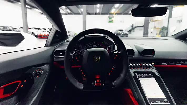White Lamborghini Huracan Tecnica rental Monaco dashboard view - mph club