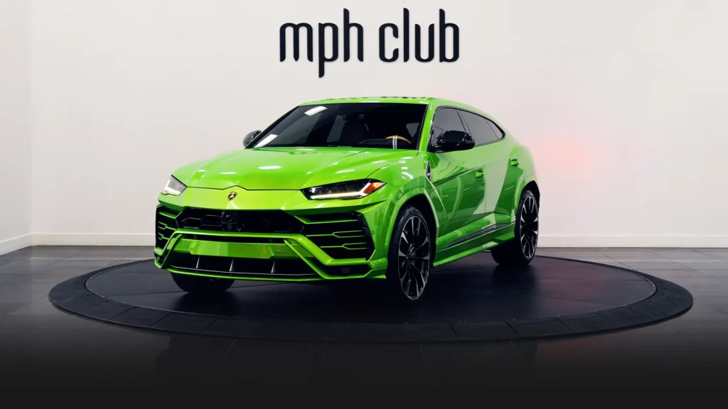 Green on brown Lamborghini Urus rental profile view - mph club