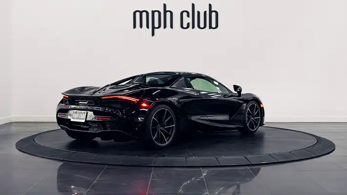 Black McLaren 720s Spider rental rear view - mph club