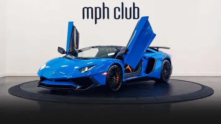 Blue Lamborghini Aventador SV Roadster rental profile view rszd - mph club