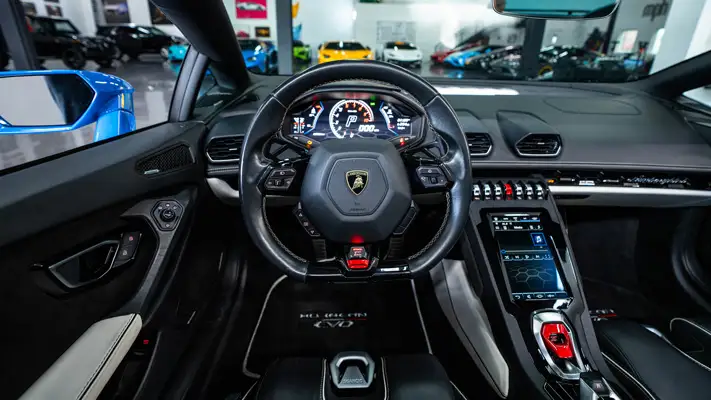 Blue Lamborghini Huracan EVO Spyder rental dashboard view - mph club